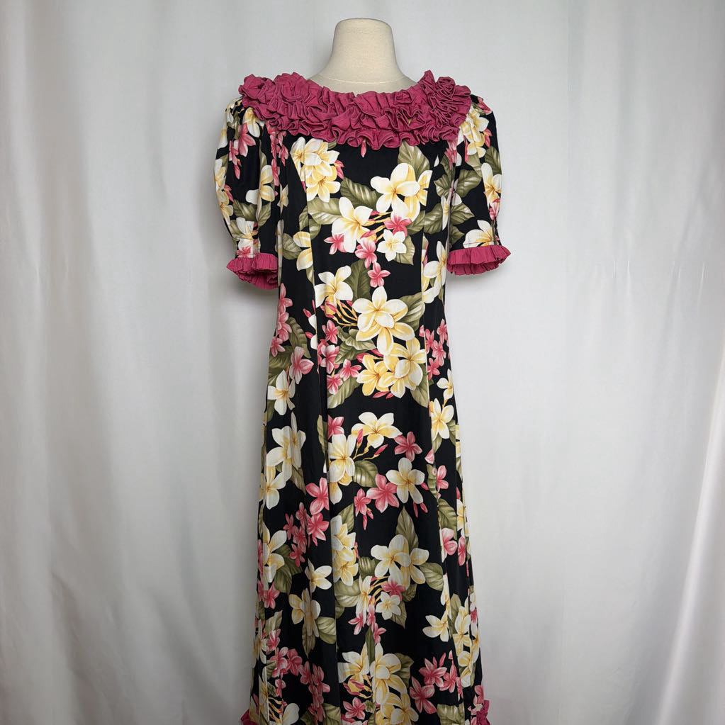 long floral dress against white background