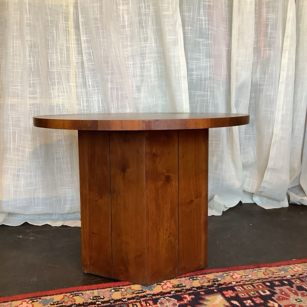Wooden table against a white curtain backdrop
