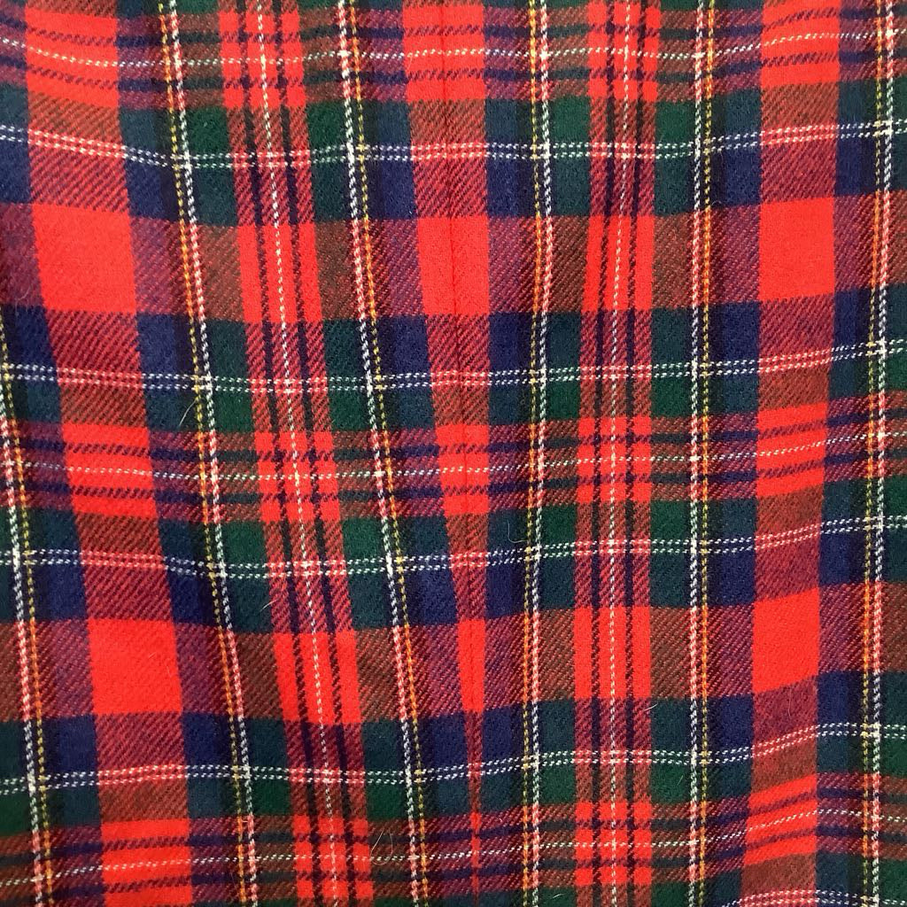 Close-up of a red, green, and blue plaid fabric pattern