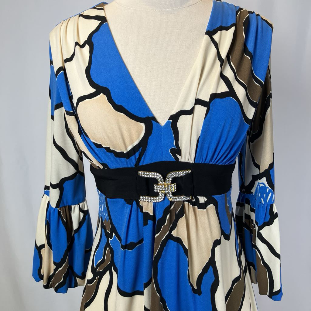 Blue and white patterned dress with a rhinestone buckle against a white background.