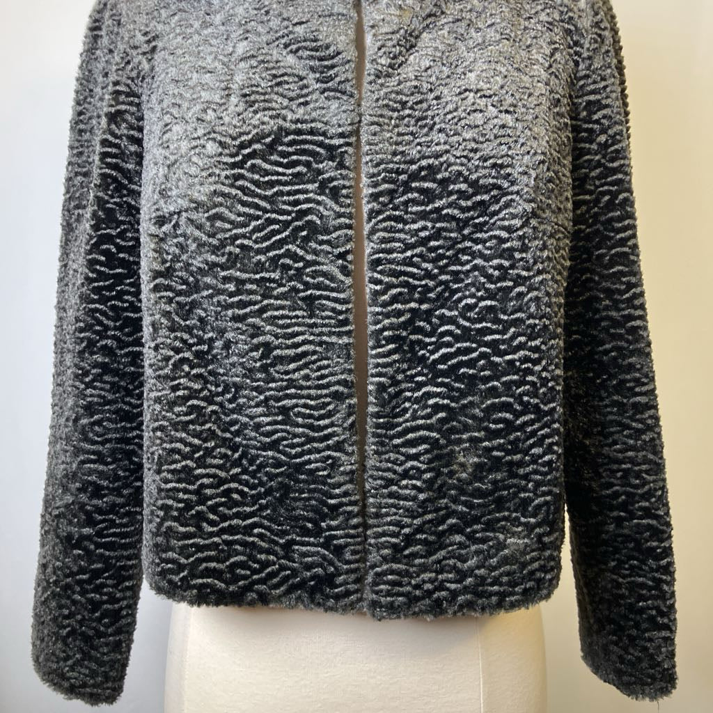 Textured gray jacket on a mannequin against a plain background