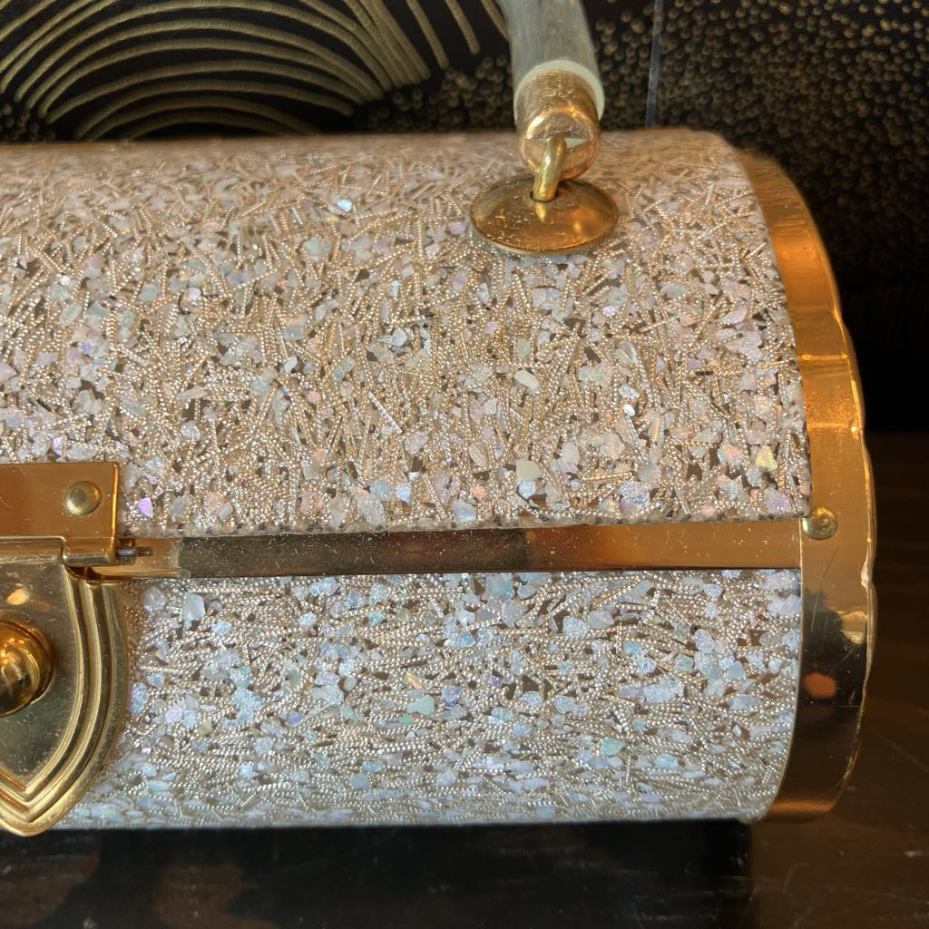 Close-up of a confetti pattern on lucite bag.