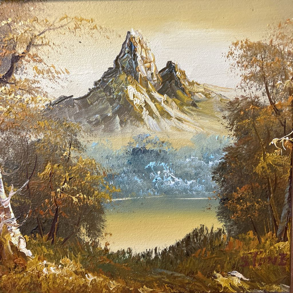 Landscape painting of a mountain with trees and water