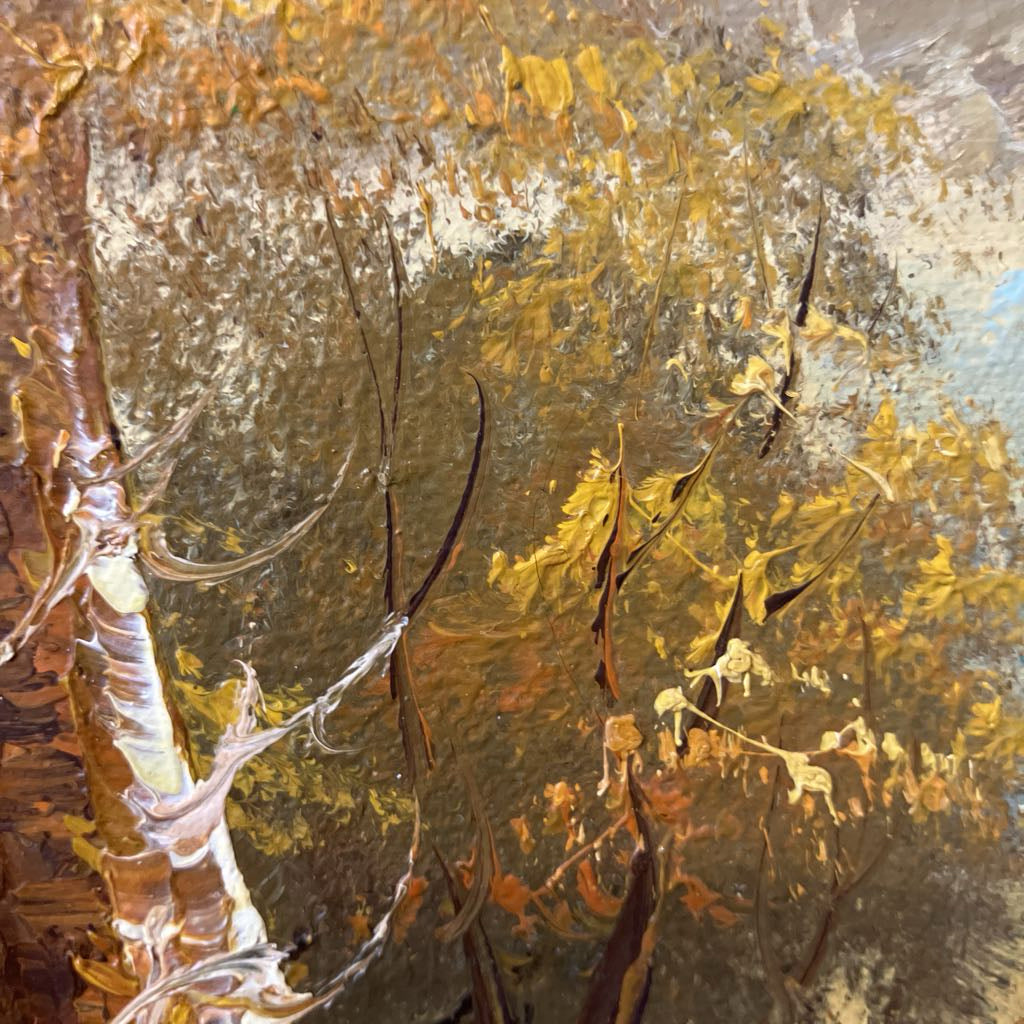 Close-up of painting with brown, gold, and white colors