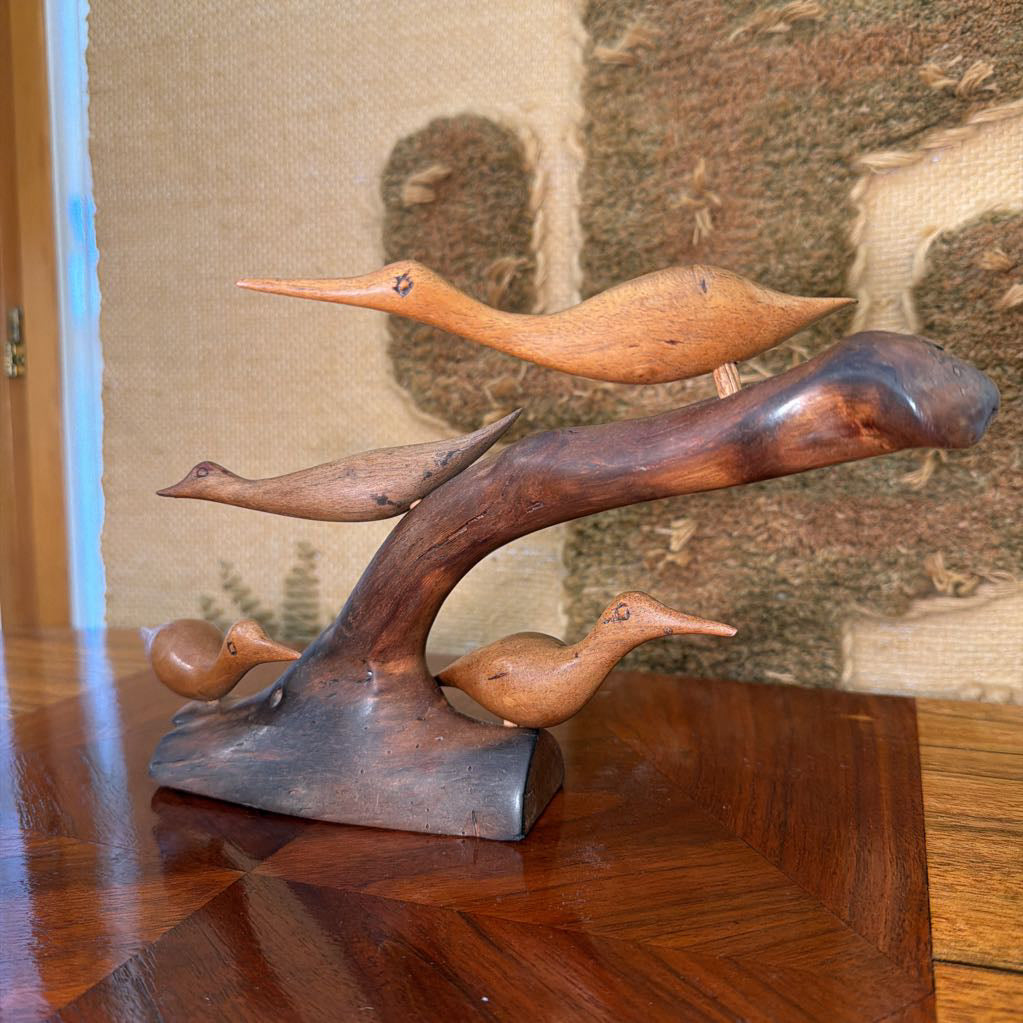 Carved Wood Birds on Limb