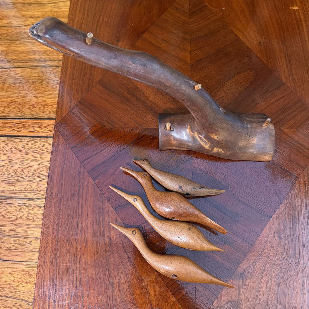Carved Wood Birds on Limb
