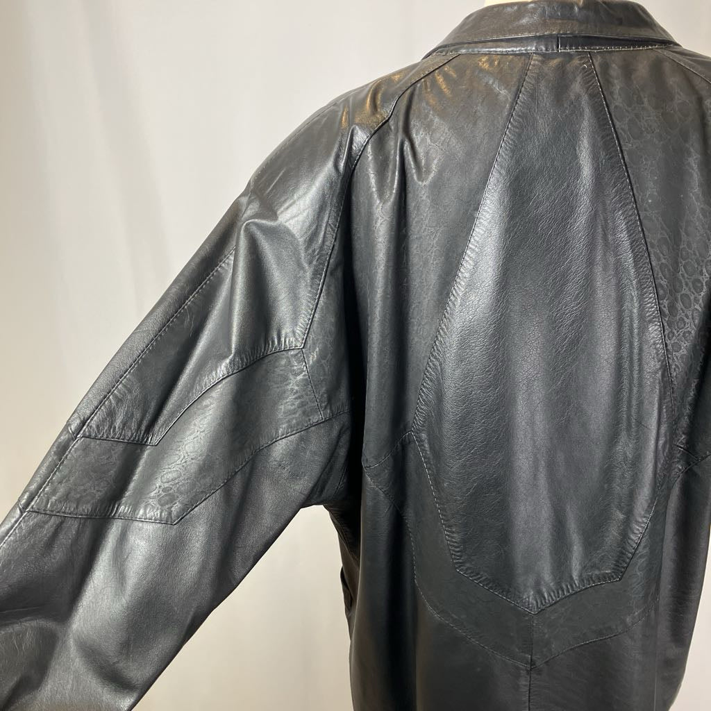 Black leather jacket on a plain background