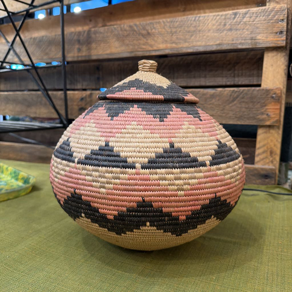 Patterned basket against wood background
