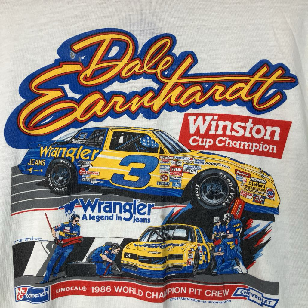 Vintage t-shirt featuring Dale Earnhardt and Wrangler branding with a race car design.