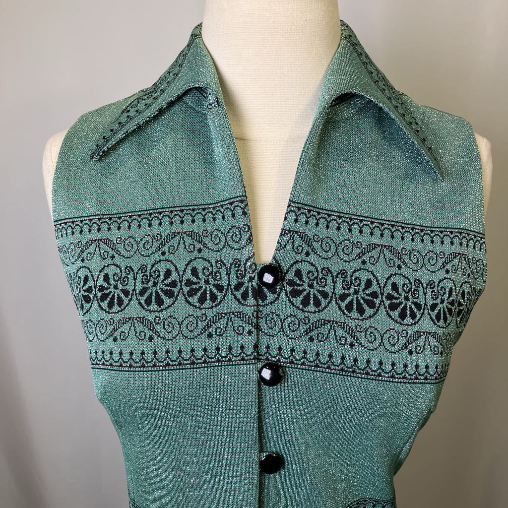Green patterned vest on a mannequin against a neutral background