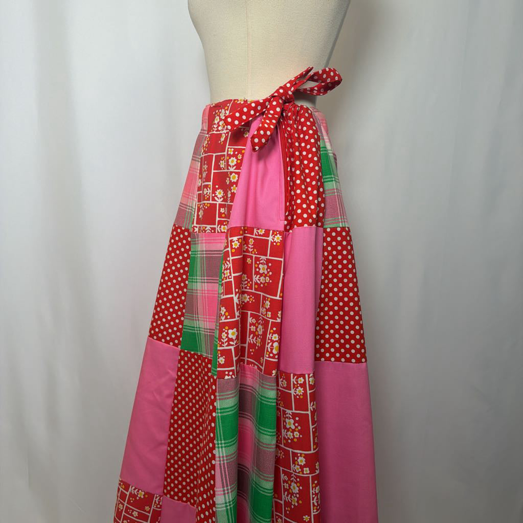 Colorful patchwork skirt on a mannequin against a white background