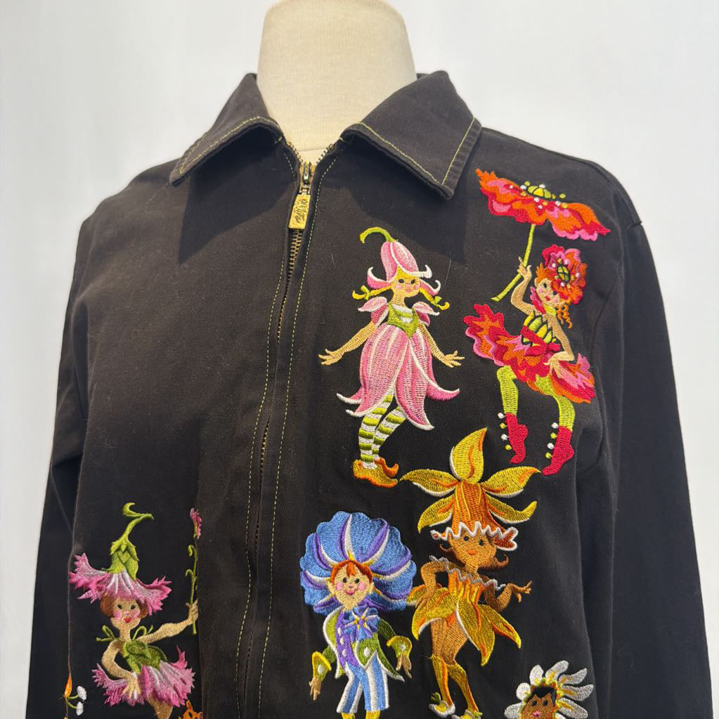 Black jacket with colorful embroidered fairies on a white background
