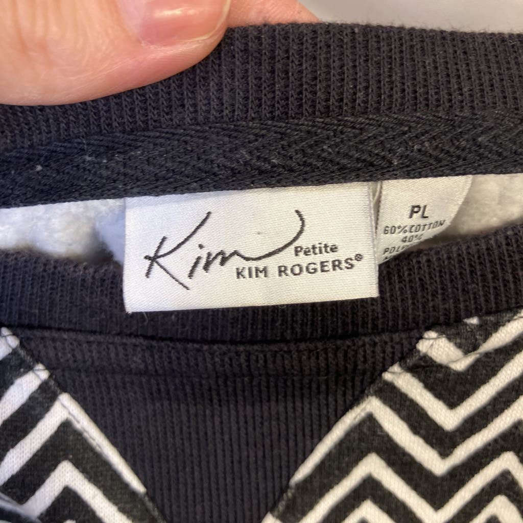 Kim Rogers label on a garment with black and white pattern