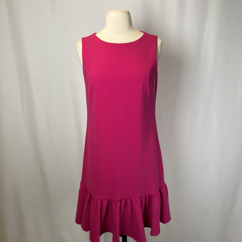 Pink drop waist dress on a mannequin against a white background.