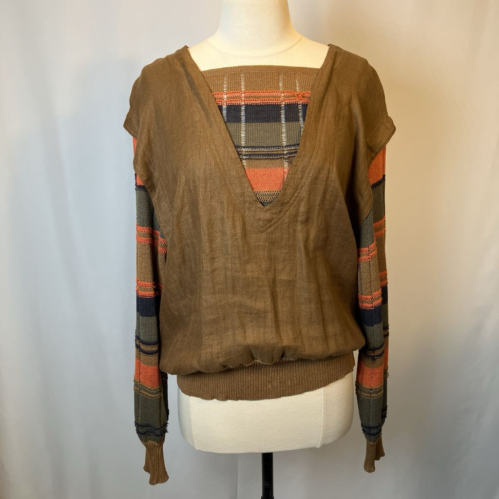 Brown sweater with plaid pattern on a mannequin against a white background