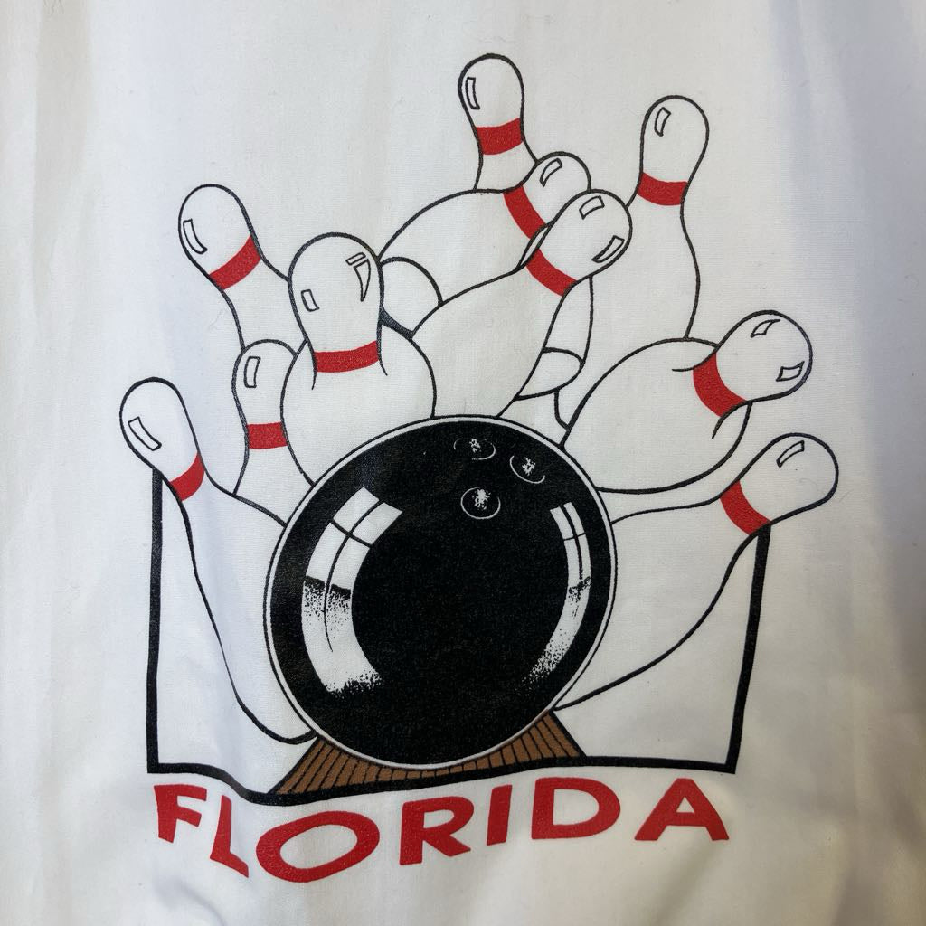 Bowling ball and pins design with 'Florida' text on a white background
