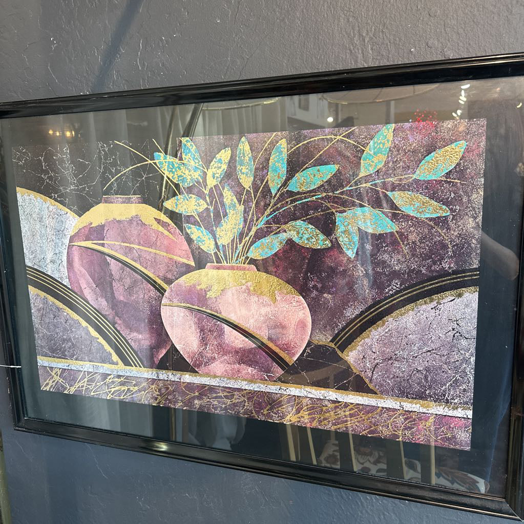 Decorative glass panel with pink vases and green leaves in a black frame.