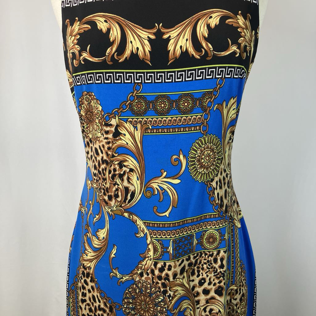 Dress with gold, blue, and leopard print pattern on a white background