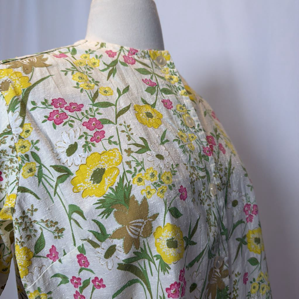 Floral-patterned fabric on a mannequin with a plain background