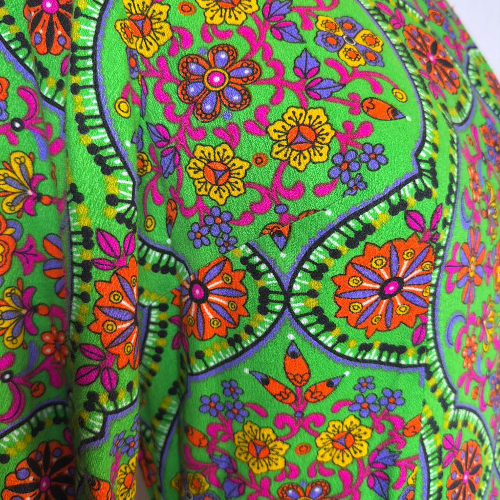 Colorful floral pattern on a green background