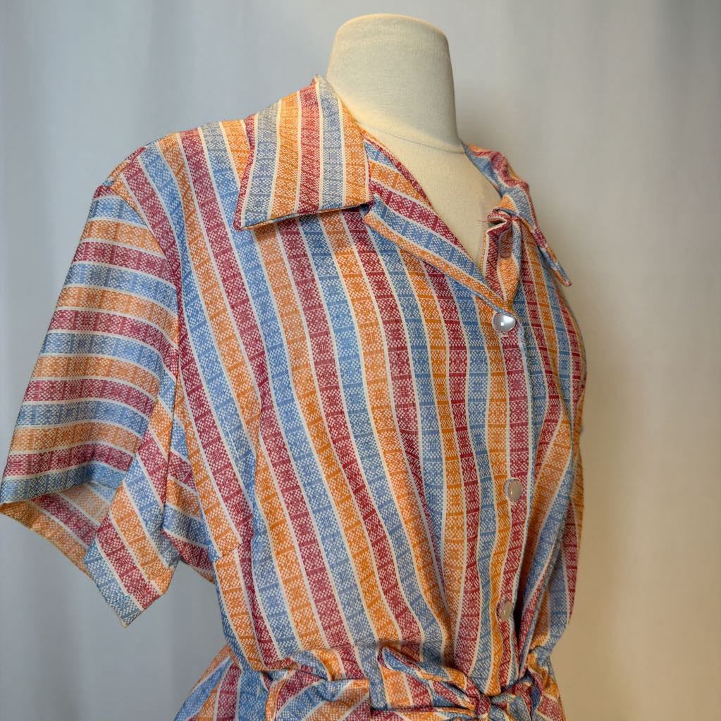 Colorful striped shirt on a mannequin against a plain background