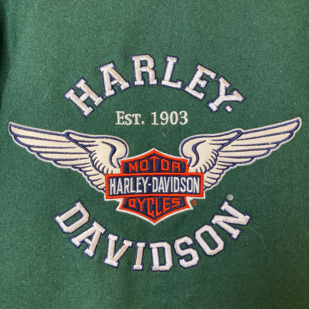 Harley Davidson logo on a green background