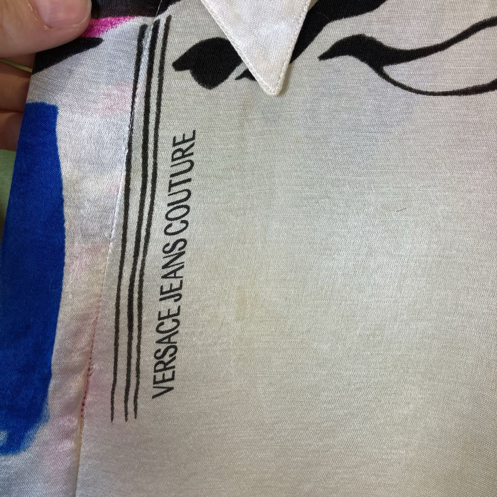 Versace Jeans Couture label on a garment with a close-up view.