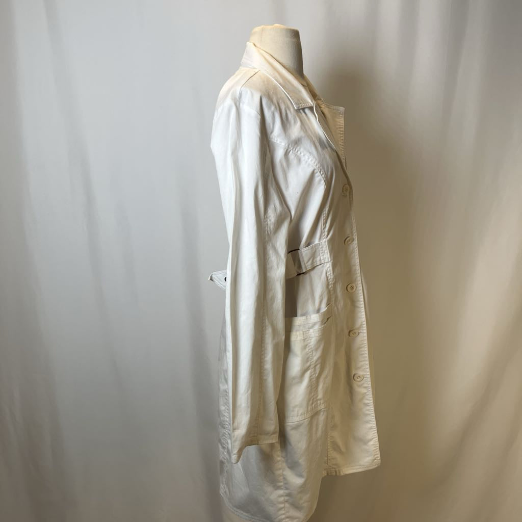 Beige jacket on a mannequin against a plain white background