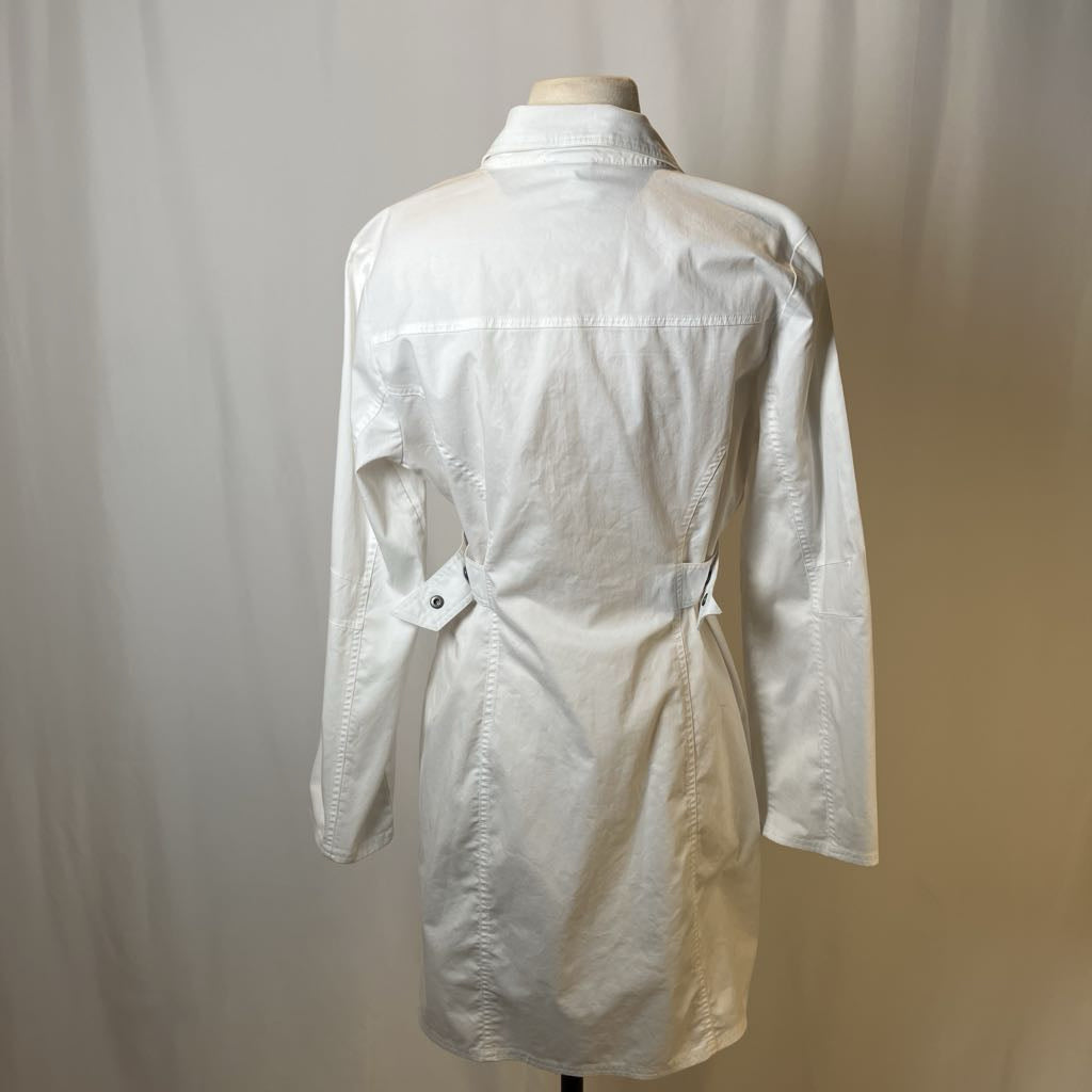 White shirt on a mannequin against a plain background