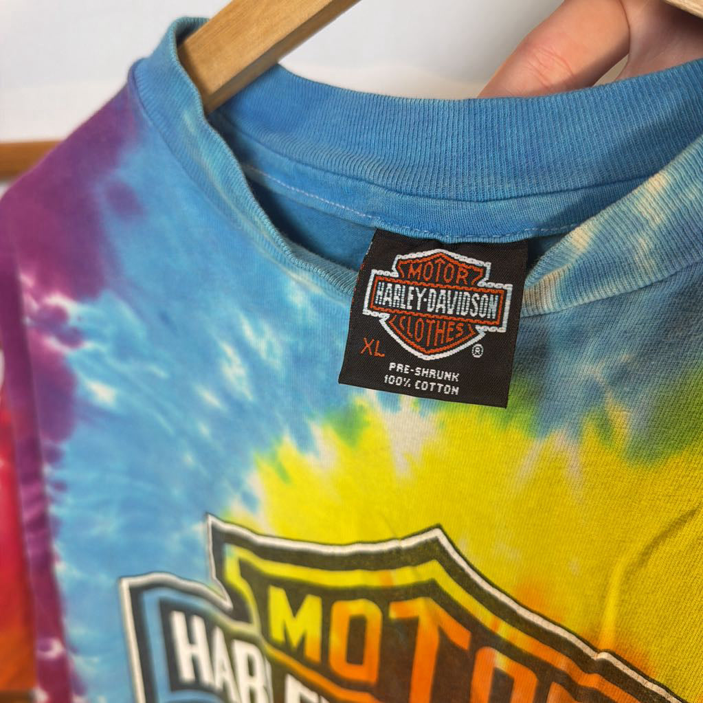 Tie-dye shirt with Harley-Davidson logo and tag on a hanger