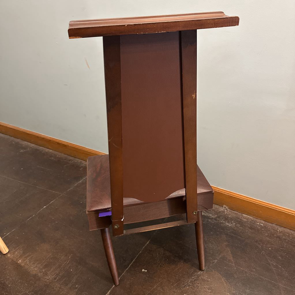 Back of the brown valet chair