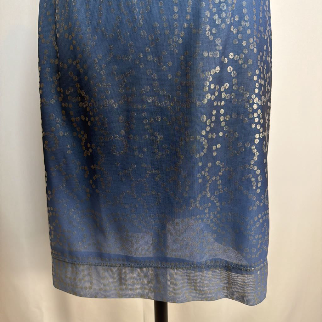 Blue skirt with a subtle pattern on a mannequin against a plain background