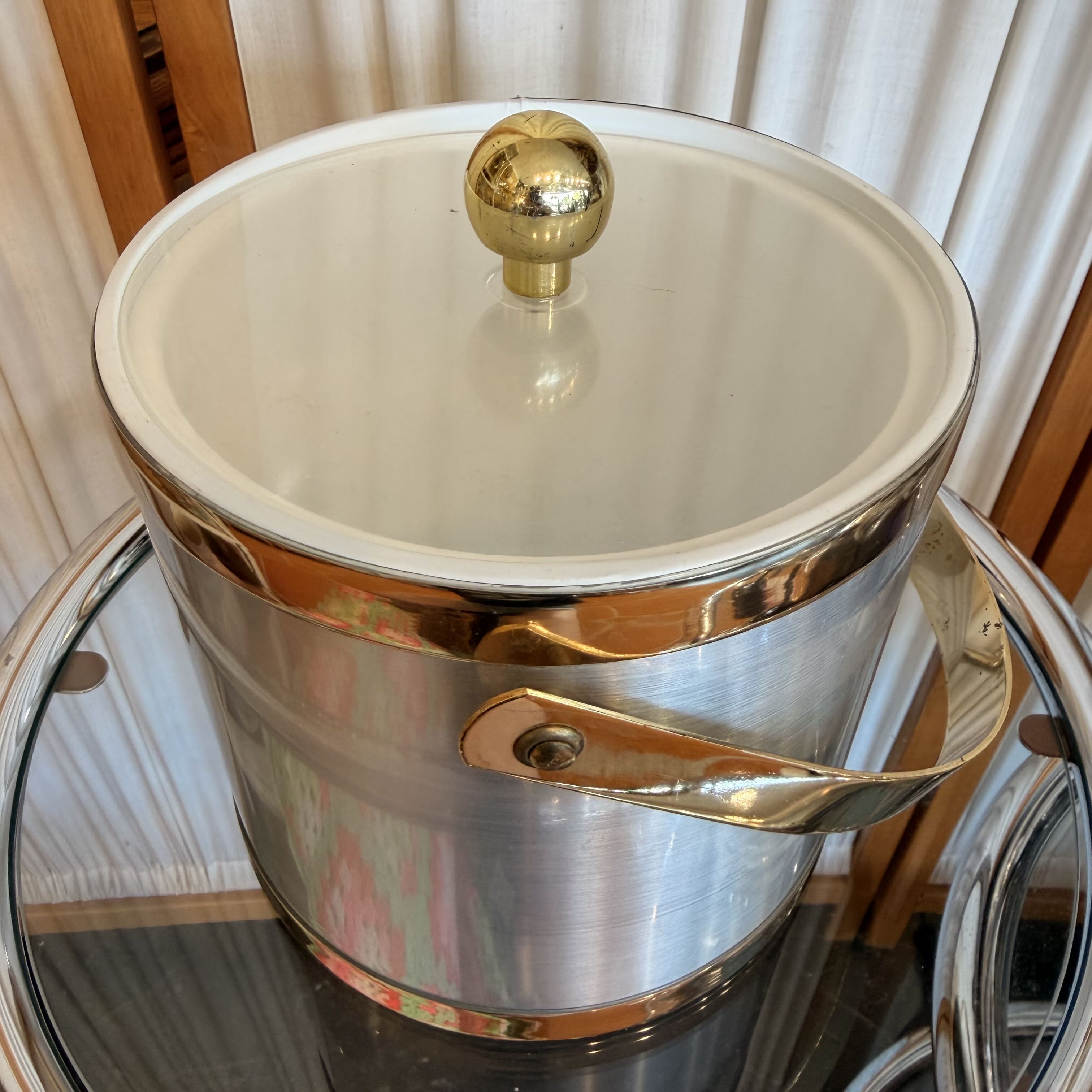 Silver and gold ice bucket