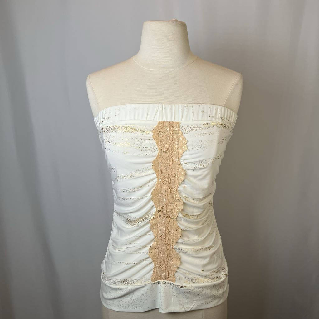 White strapless top with lace details on a mannequin against a gray background