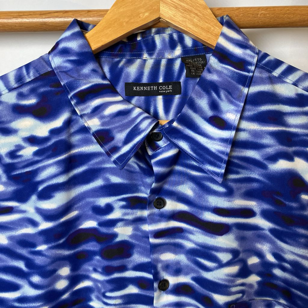 Blue patterned shirt on a hanger with Kenneth Cole label