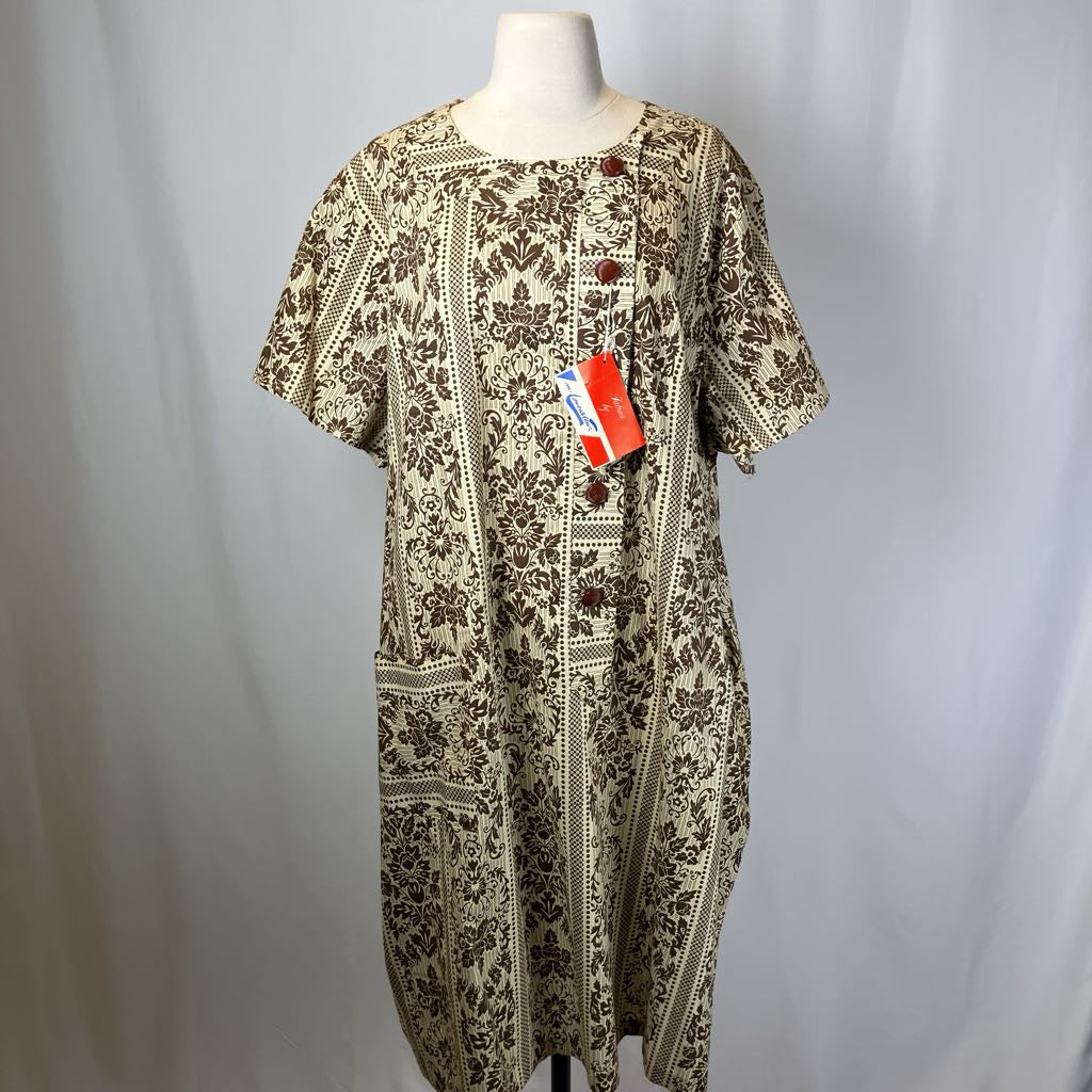 Patterned dress on a mannequin with a plain background