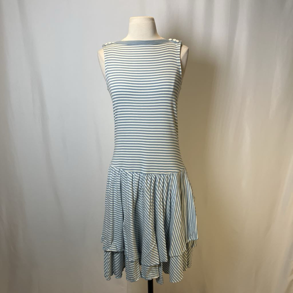 Striped dress on a mannequin against a plain background