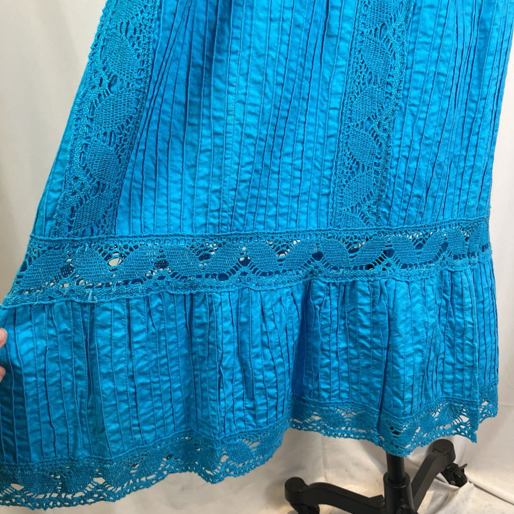 Blue lace fabric on a white background