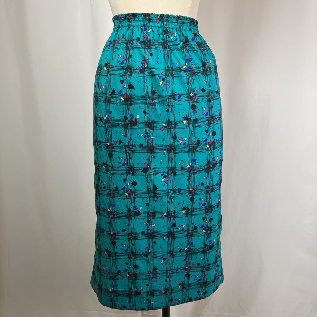 Teal plaid skirt on a mannequin against a plain background