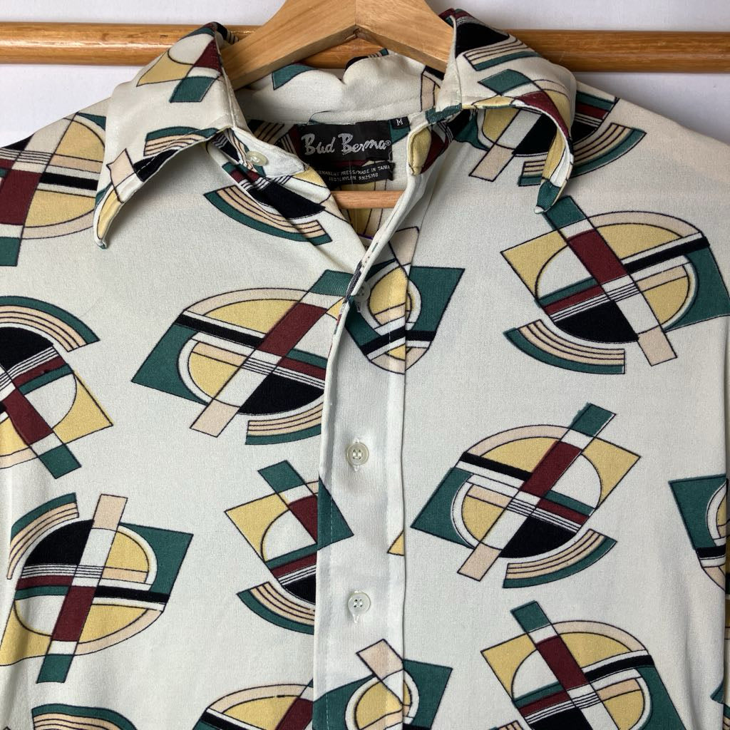 Vintage shirt with geometric pattern on a hanger
