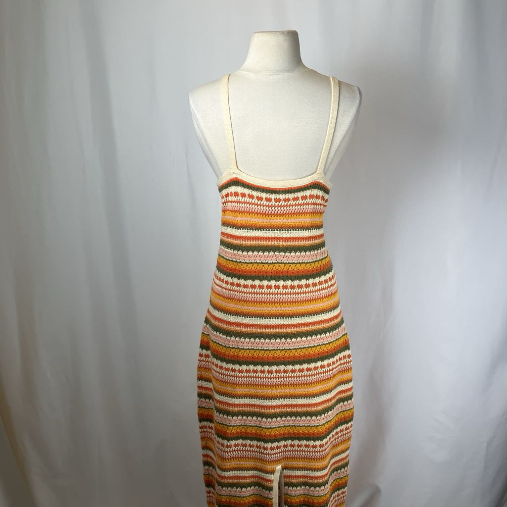 Striped dress on a mannequin against a plain background