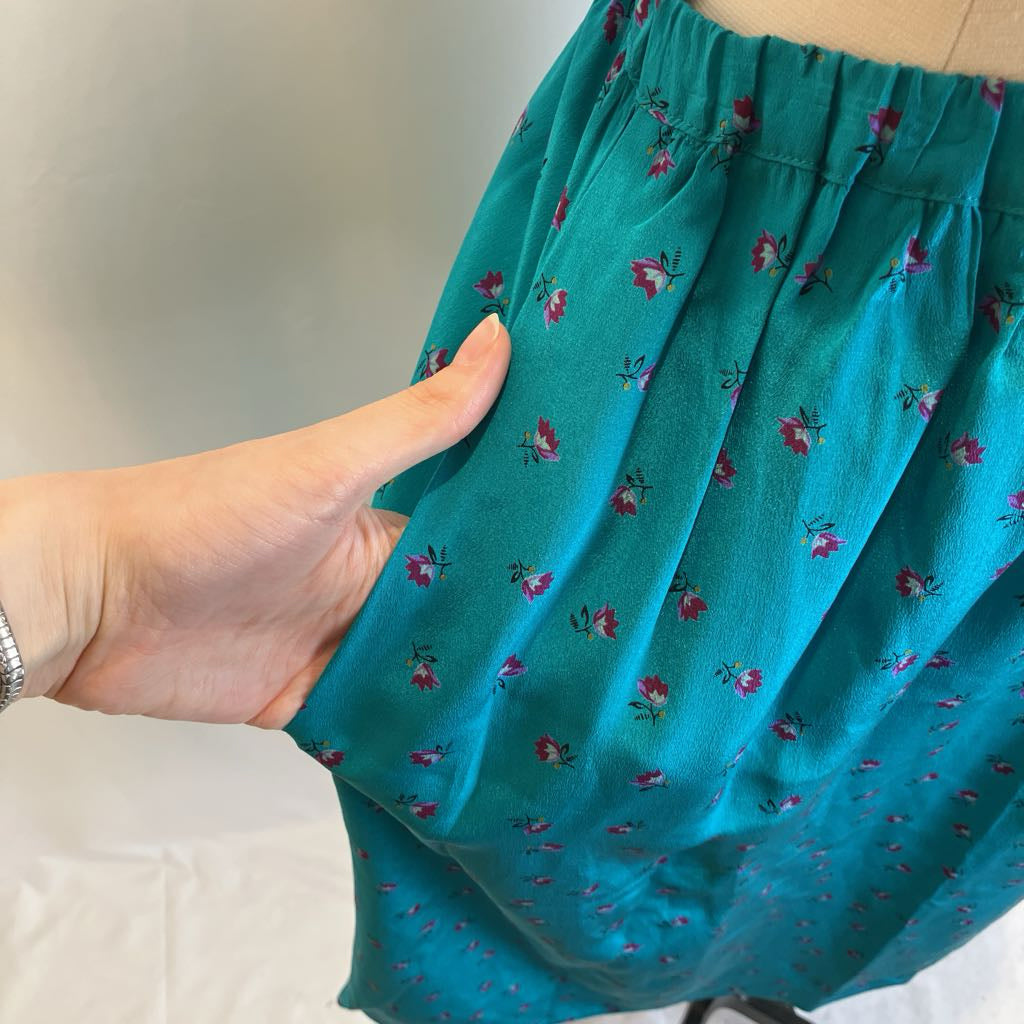 Closeup of the pleats in silk skirt