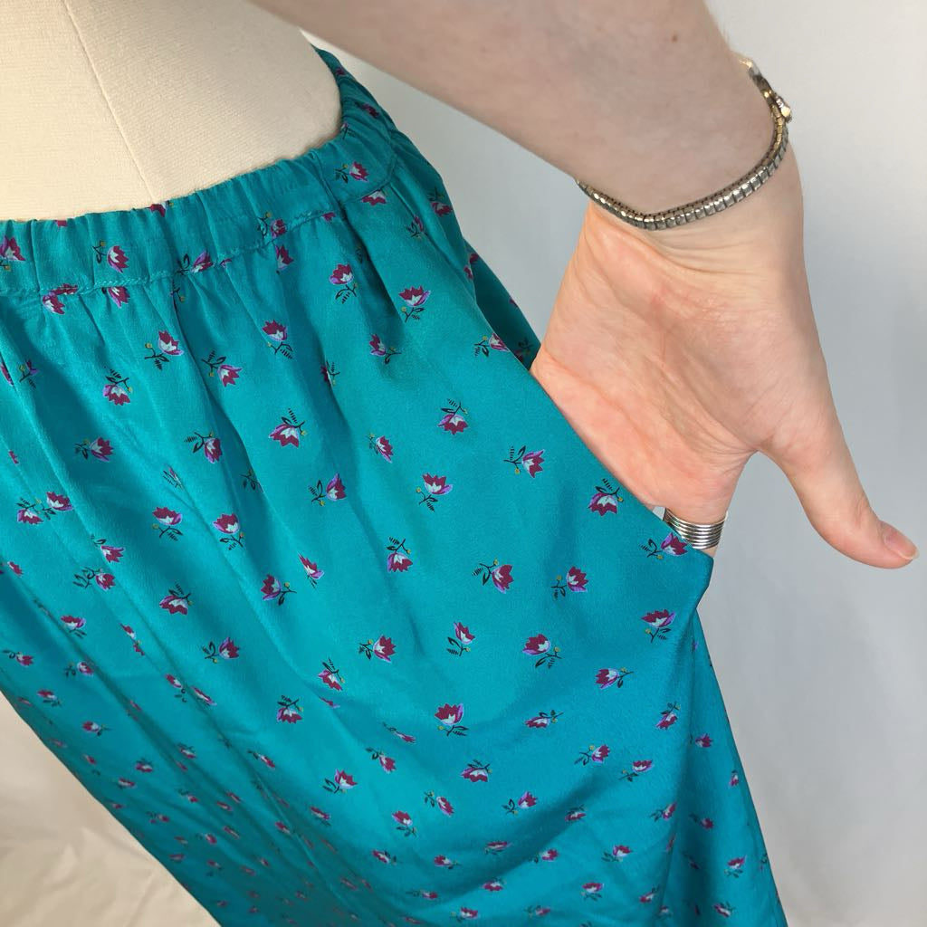 Closeup of the pocket of the silk skirt