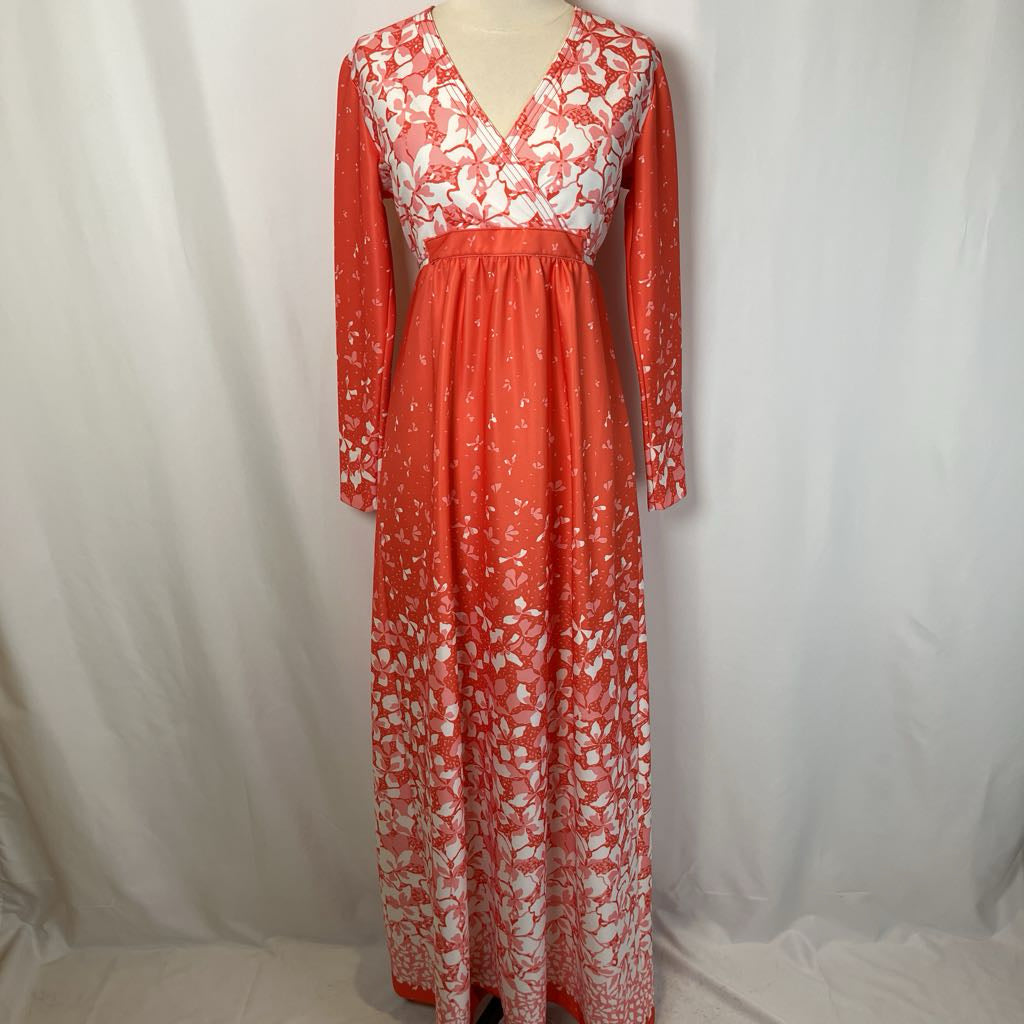 Maxi dress with floral motif on mannequin with plain white background