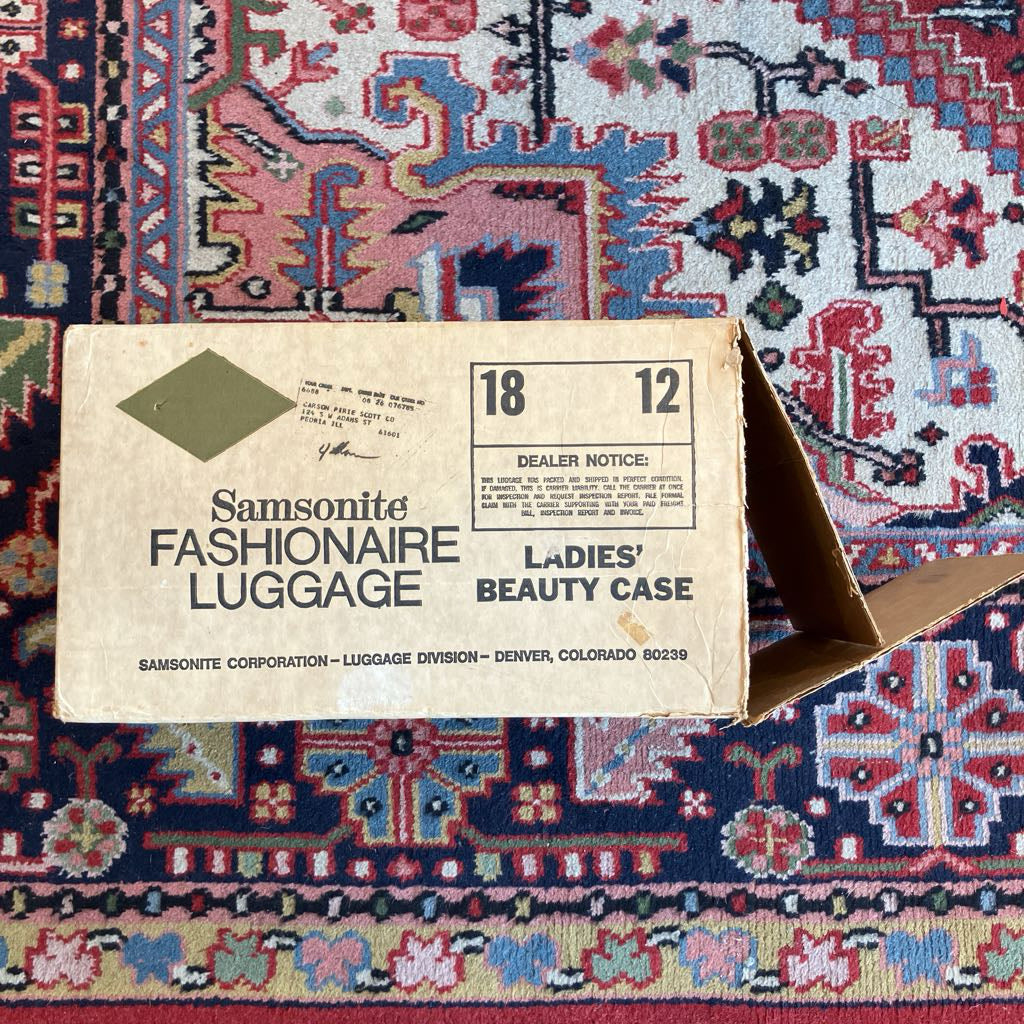 Samsonite Fashionaire Luggage Ladies' Beauty Case packaging on a patterned rug