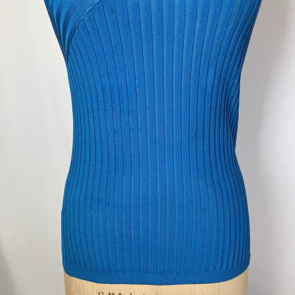 Blue ribbed top on a mannequin against a plain background