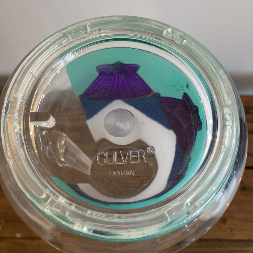 Clear container with a blue and purple object inside, branded 'Culver'.