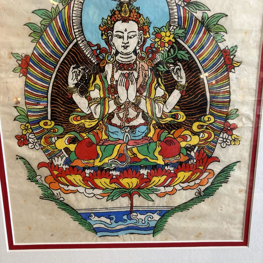 Colorful depiction of a seated figure with intricate patterns and symbols on a textured background