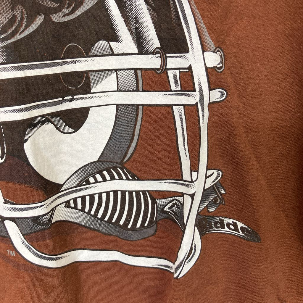 Close-up of a football helmet graphic on a brown background