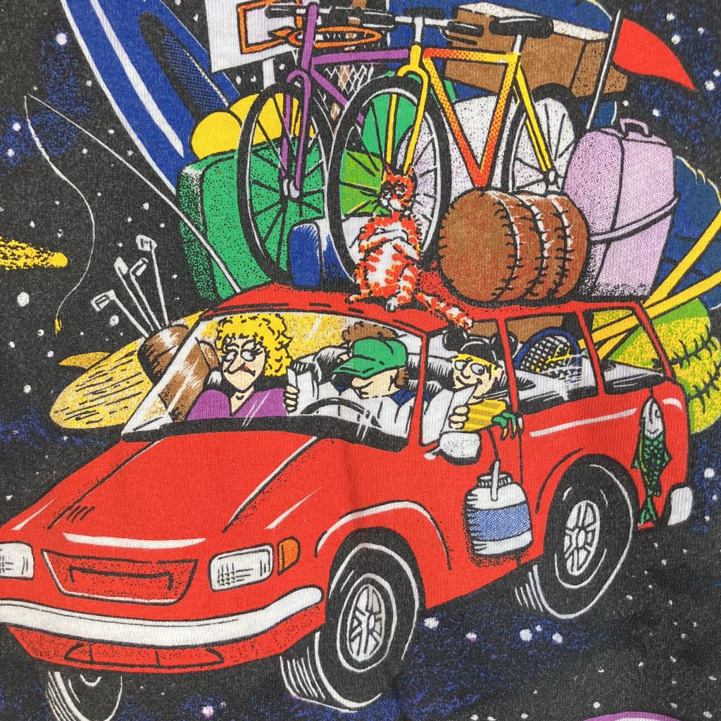 A colorful cartoon-style illustration of a red station wagon carrying bicycles, luggage, and other travel items, with people driving and a cat sitting on the roof, set against a starry space background.